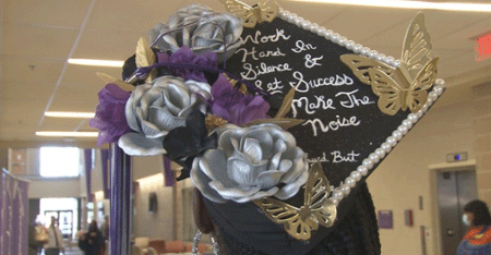 A graduate's decorated graduation cap at MGA's spring 2022 commencement cermony.
